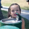 This young lady takes a break from all the fun at the Central Valley Pizza Festival held April 13-4 in Lemoore's Downtown Park.